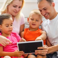 family with tablet